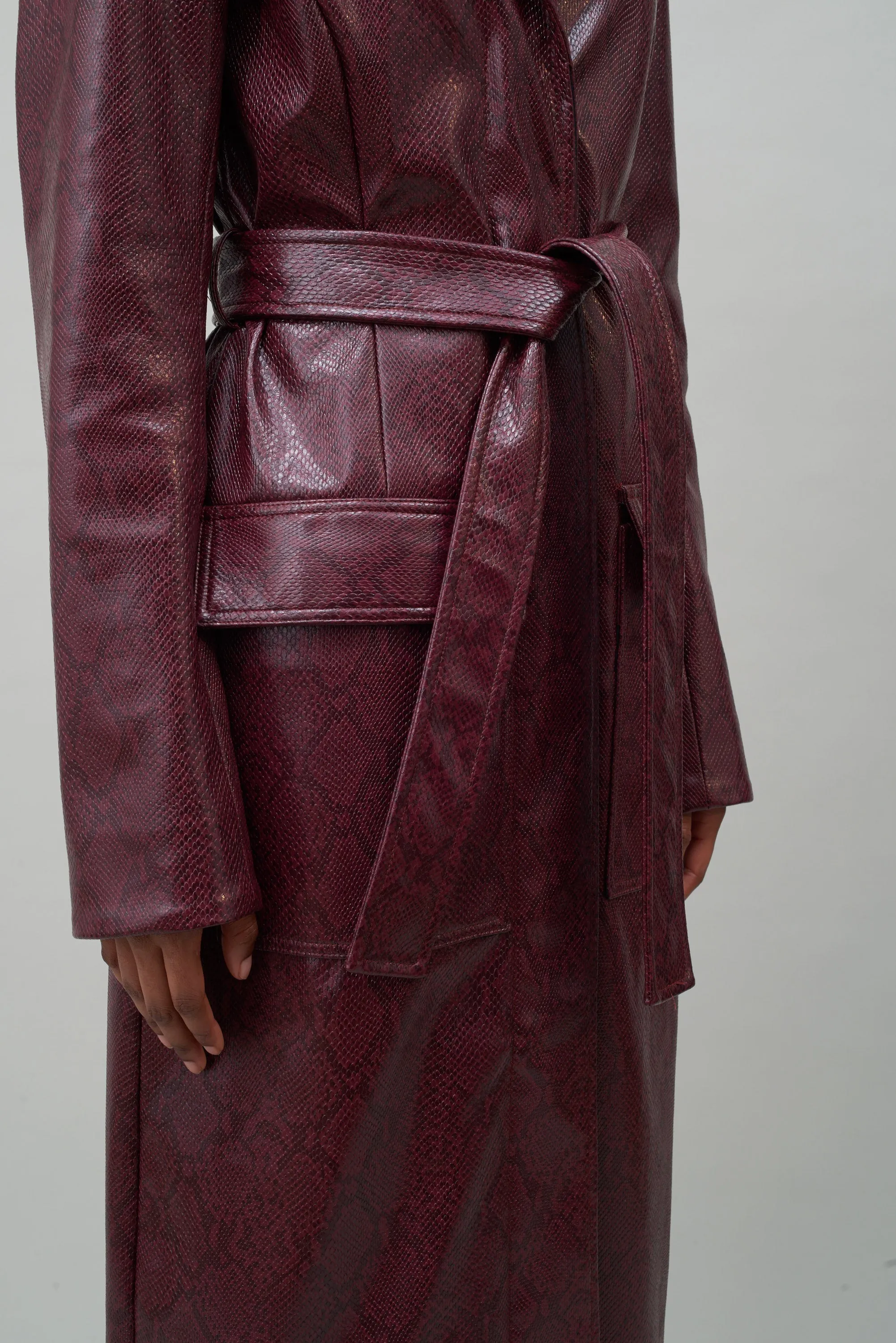 BELTED TRENCH COAT - BURGUNDY FAUX SNAKESKIN