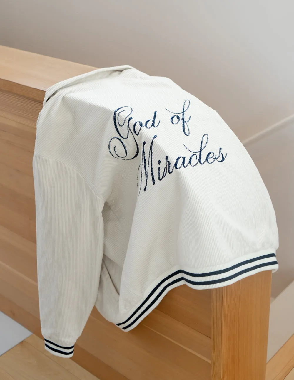 God of Miracles Ivory Bomber Jacket